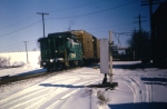 Conductor on NB PC fght picking up orders at Alexis twr, Dec 1969